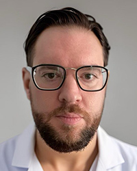 Adam Delora, MD